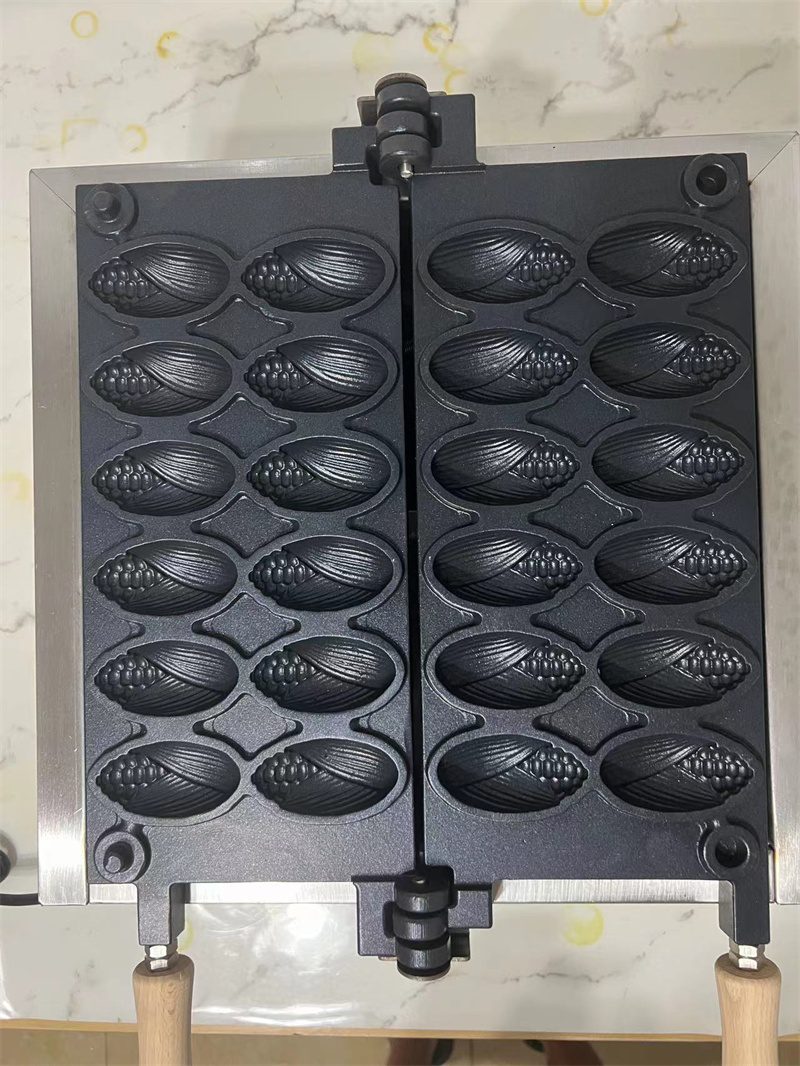 BS-1012A เครื่องทำขนมวาฟเฟิลข้าวโพดจิ๋ว 12 ชิ้น BS-1012A เครื่องทำขนมวาฟเฟิลข้าวโพดจิ๋ว 12 ชิ้น การสร้างจุดขายที่โดดเด่นและแตกต่างเป็นหัวใจสำคัญของการเรียกลูกค้า หากคุณกำลังมองหาเมนูสร้างอาชีพใหม่ หรือต้องการเพิ่มกิมมิกให้กับร้านค้า เครื่องทำขนมวาฟเฟิลข้าวโพดจิ๋ว 12 ชิ้น คือตัวช่วยที่จะเปลี่ยนแป้งวาฟเฟิลธรรมดาให้กลายเป็นขนมรูปฝักข้าวโพดสุดน่ารัก พกพาง่าย และดึงดูดสายตาได้อย่างแน่นอน